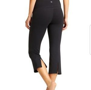 NWOT Athleta black capri yoga pants with back slit